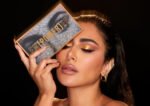 Huda Beauty Empowered Eyeshadow Palette open with 18 shades”