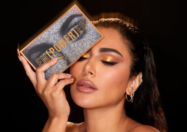 Huda Beauty Empowered Eyeshadow Palette open with 18 shades”